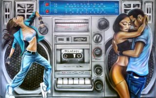 graffiti-style painting of a boom box with a couple embracing on the right and a woman dancing on the left